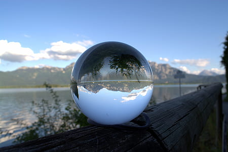 clear glass ball on fence thumbnail