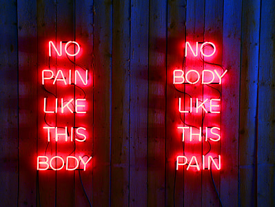 two neon signages at nighttime thumbnail