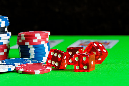 poker chips and four dices thumbnail