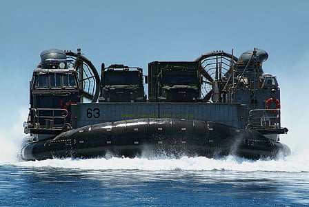 cargo carrier ship on body of water thumbnail