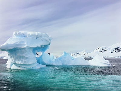 iceberg on body of water thumbnail