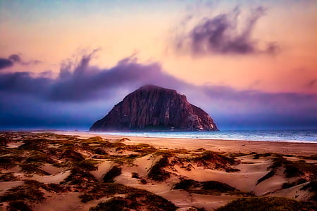 rock formation in the ocean graphic wallpaper thumbnail