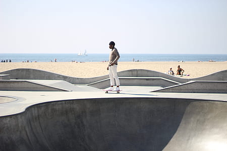 man standing on skateboard thumbnail