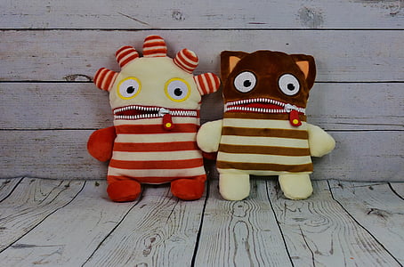 two monster plush toys thumbnail