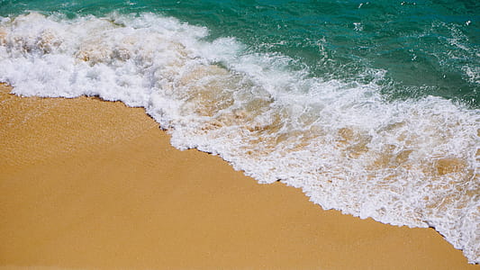 Waves Crashing On Beach Photo thumbnail