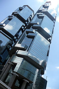 worm's-eye-view photography of glass building thumbnail