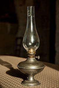 grey oil lamp on table thumbnail