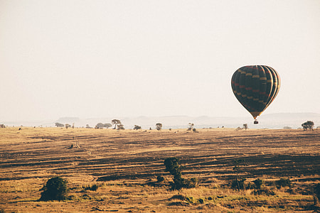 air balloon floating above desert thumbnail