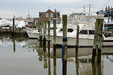Small fishing boat moored at a dock in Point Pleasant New Jersey. thumbnail