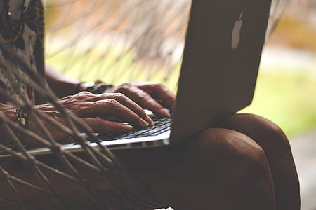 person using laptop thumbnail