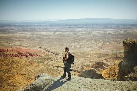 Man Standing on Peak thumbnail