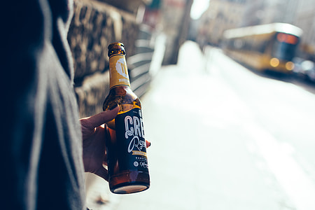 Having craft beer on a street thumbnail