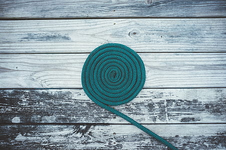 green rope on gray and white wooden panel thumbnail