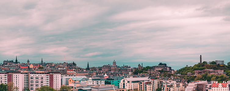 view of cityscape during cloudy day thumbnail