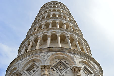 low-angle photograph of white concrete tower thumbnail