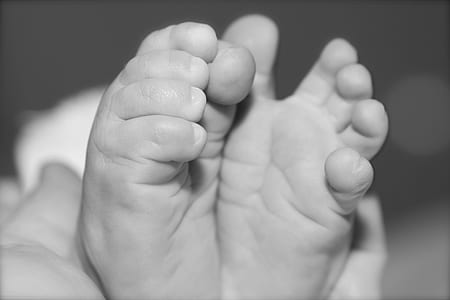 grayscale photo of baby's feet thumbnail