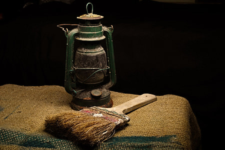 green gas lantern near brown brush thumbnail