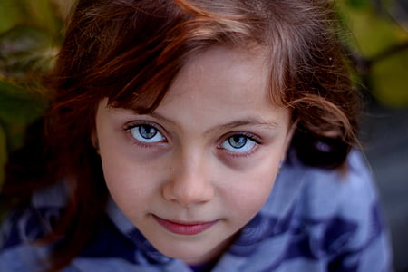 girl wearing purple and blue top thumbnail