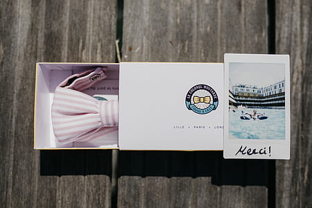 white and pink bowtie on box thumbnail