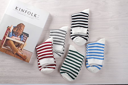 five pairs of assorted-color stripe socks near box thumbnail