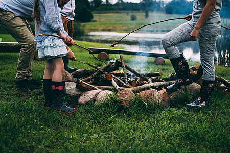 group of people in front of bonfire thumbnail