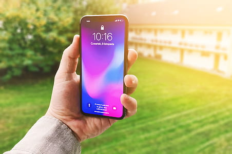 person holding black Android smartphone thumbnail