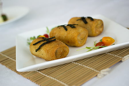 three bread on white plate thumbnail