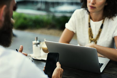 man, woman, smartphone, laptop thumbnail