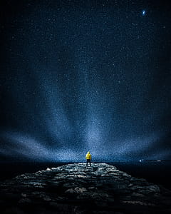 Man Standing on Clif thumbnail