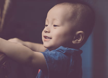 Close-Up Photography of a Smiling baby thumbnail