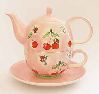 pink and red ceramic kettle on top of pink saucer thumbnail