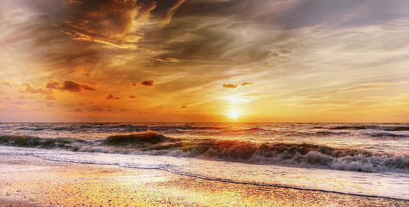 photography of ocean waves during golden hour thumbnail