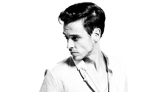 Grayscale Photo of Man Wearing Button Up Shirt thumbnail