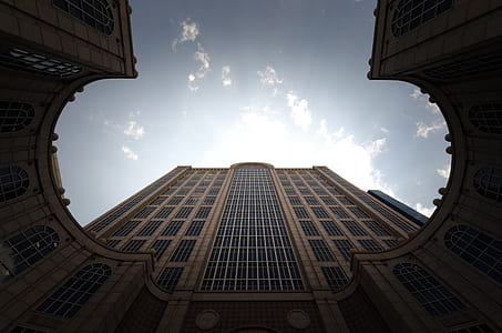 low angle photography of brown building thumbnail