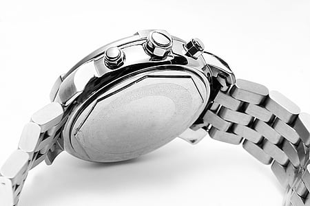 round silver-colored watch with link thumbnail
