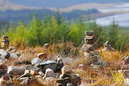 selective focus photo of cairn thumbnail