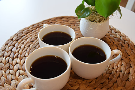 three ceramic cups with coffees thumbnail