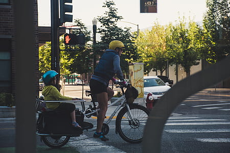 Person Riding Bicycle On Street thumbnail