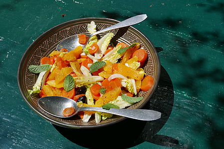 vegetable salad in round brown ceramic plate thumbnail