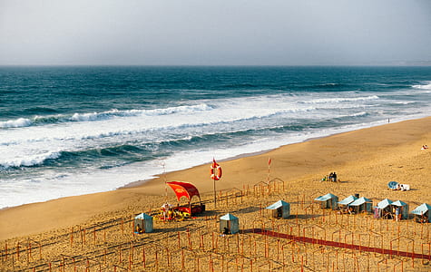 beach shore beside tent thumbnail