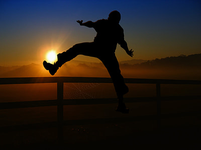 person's silhouette during golden hour thumbnail