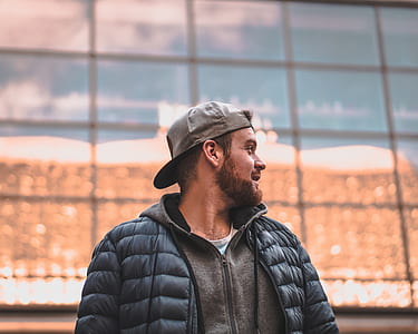 man wearing black bubble jacket thumbnail