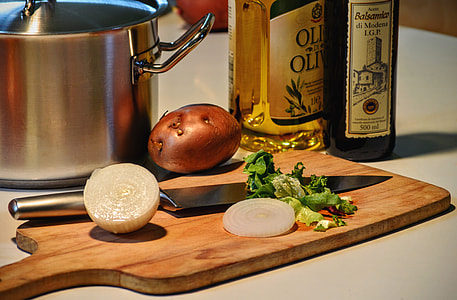 gray kitchen knife on chopping board thumbnail