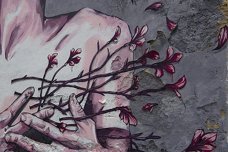 person holding red flowers painting thumbnail