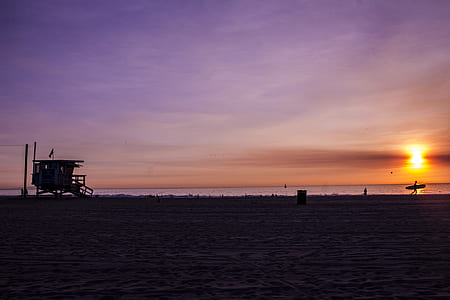 silhouette of guard house on seashore thumbnail