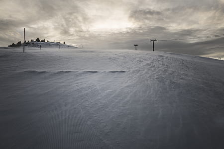 low angle photography of snow mountain slope thumbnail