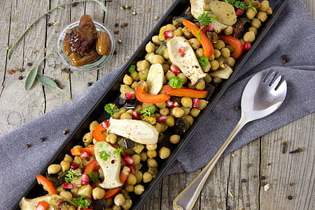 assorted vegetables on black plate thumbnail