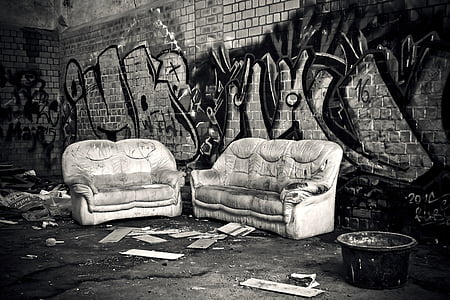 two empty gray sofas thumbnail