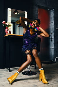 Photo of Woman Wearing Funky Dress thumbnail