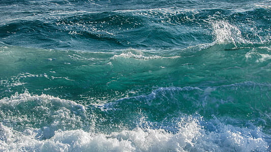 aerial view photography of sea waves thumbnail